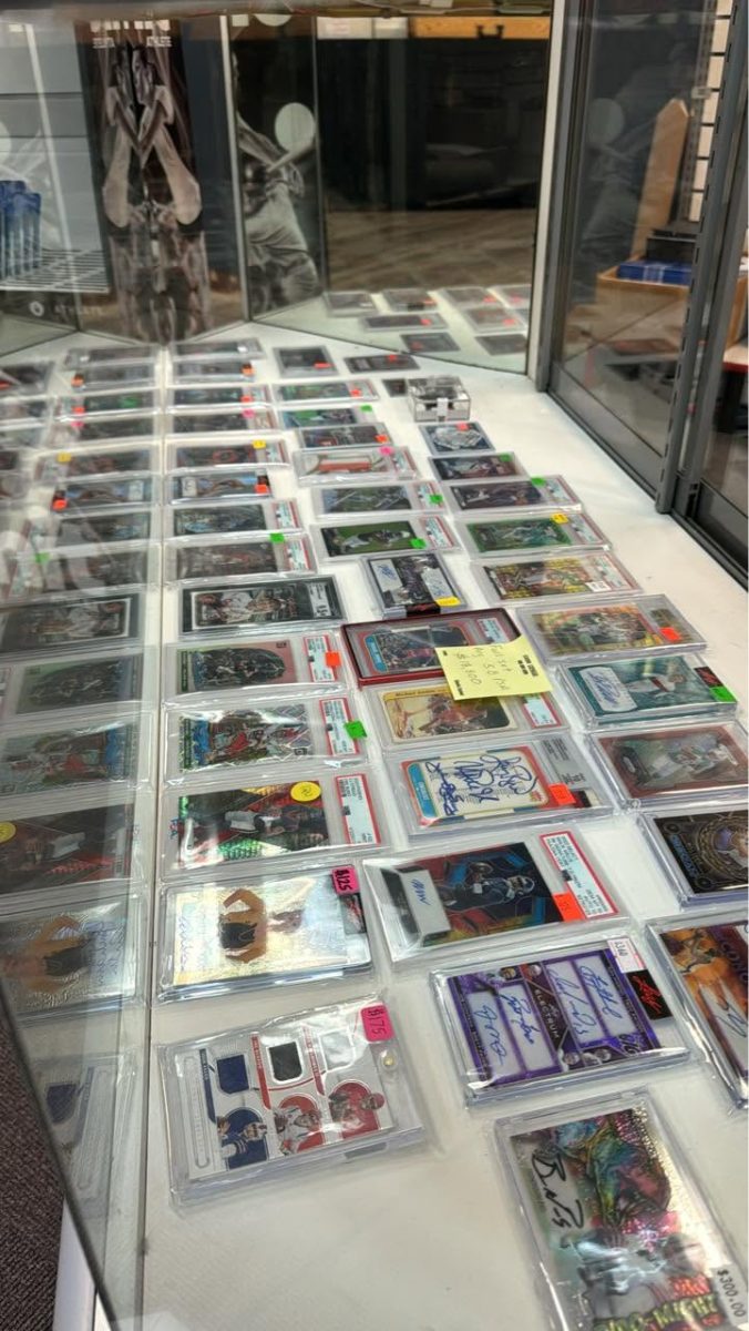Display case of PSA and BGS graded sports cards